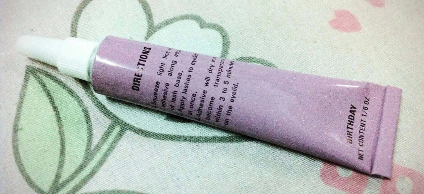 Birthday Lash Adhesive purple cosmetic tube with precision applicator tip