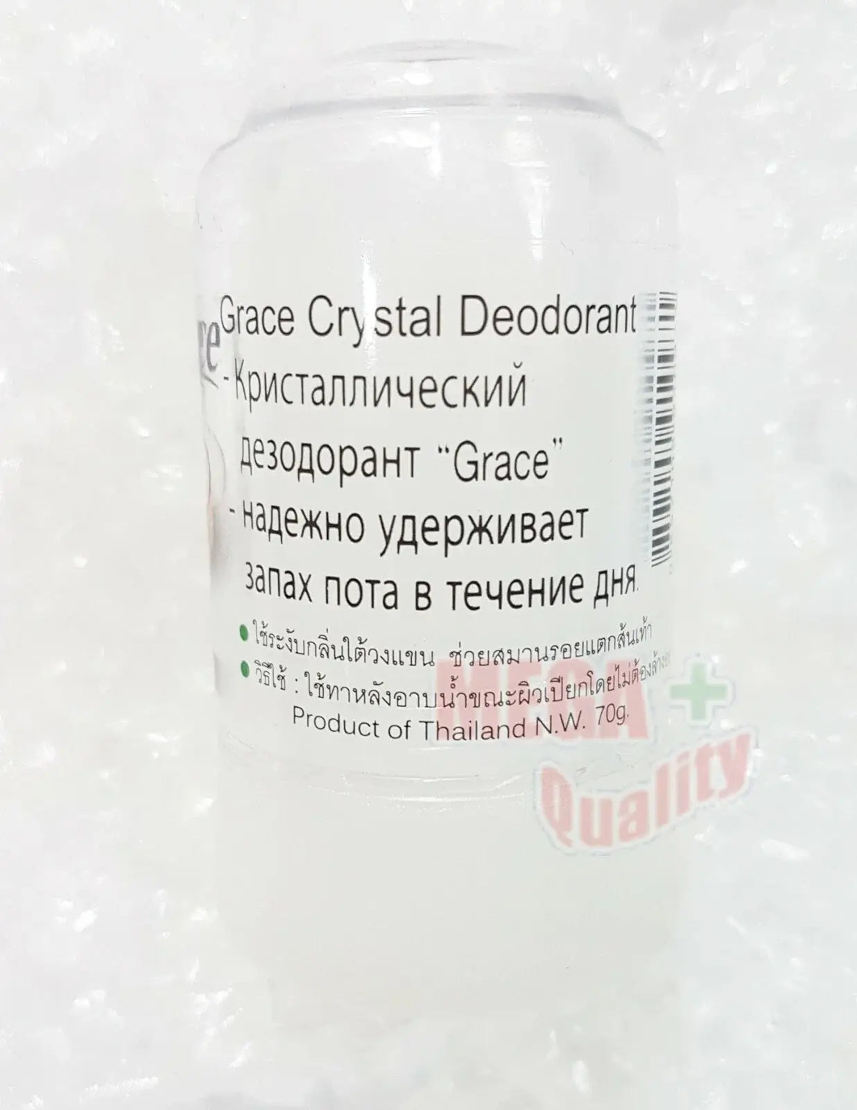 A detailed close-up of the bottom and side label of Grace Crystal Coconut Deodorant 70g, featuring 'Product of Thailand' text, N.W. 70g, and international symbols.