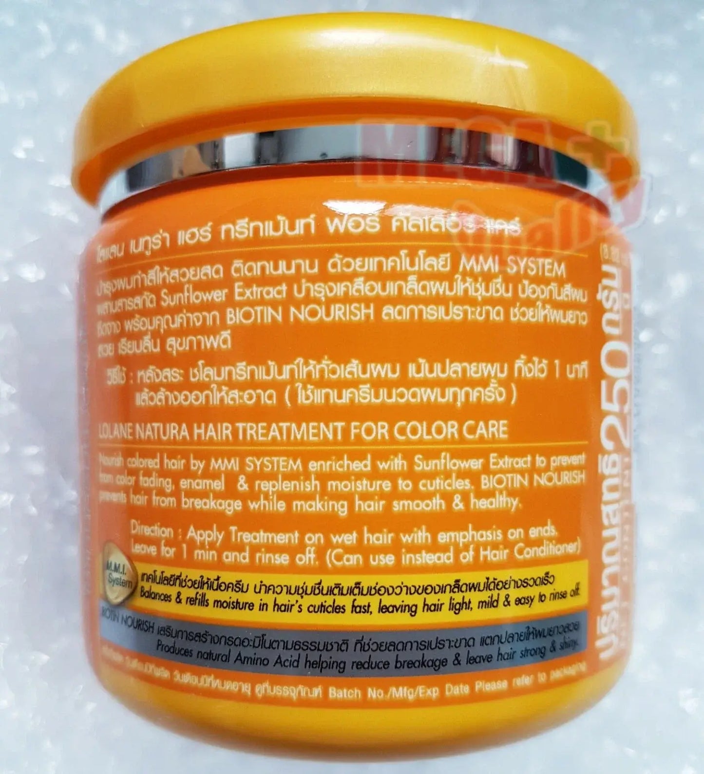 The back of a yellow jar of Lolane Natura Hair Treatment showing the detailed English product description, directions, and full ingredients list.