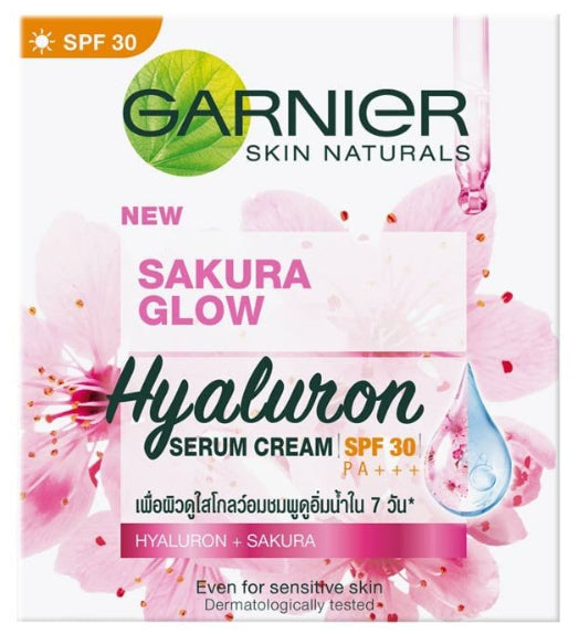 Garnier Sakura Glow Hyaluron Serum Cream SPF30 packaging with cherry blossom design.