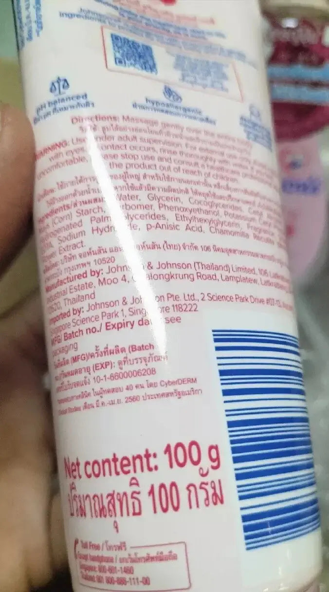 Close-up of johnsons baby cream face body back packaging highlighting net content text