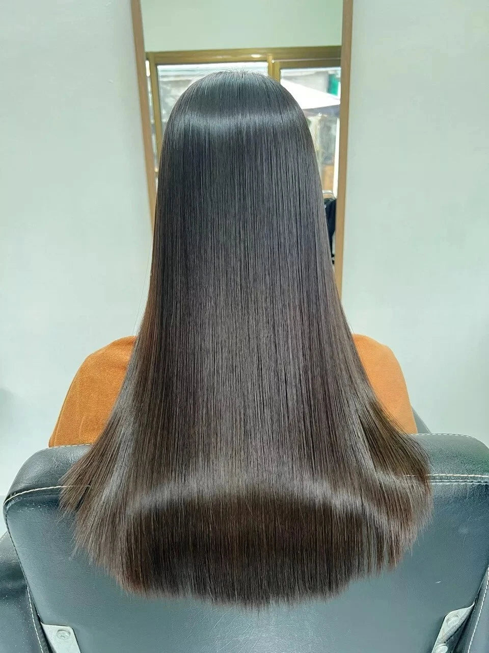 Dcash Defender Hair Coat result showing smooth and shiny long dark hair with a healthy glossy finish.