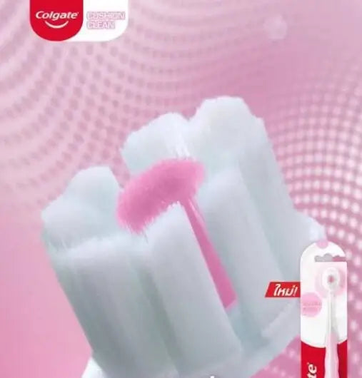 Colgate Cushion Clean Toothbrush close-up of super-dense fluffy soft bristles with pink center for gentle gum massage