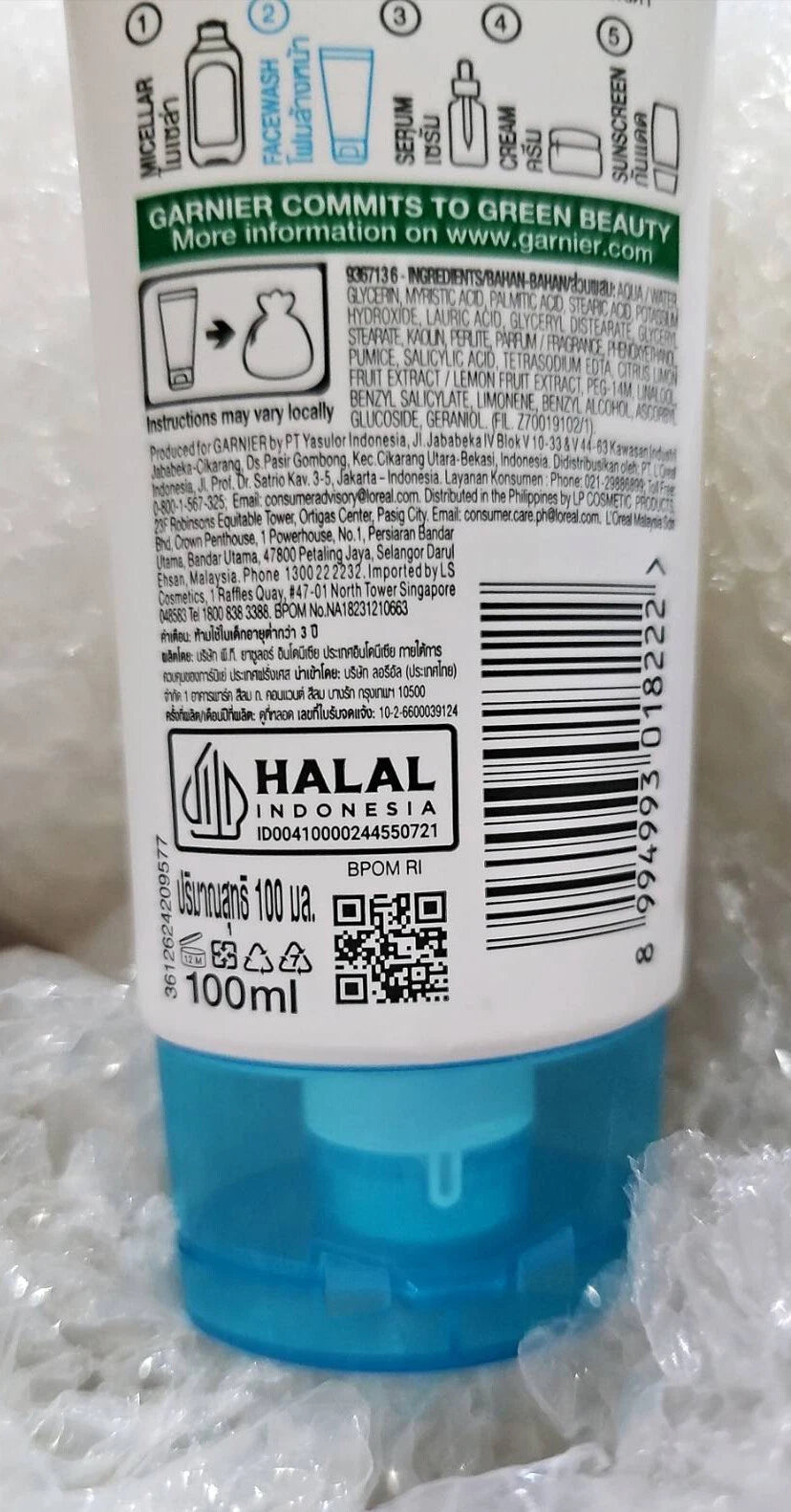 Garnier Bright Anti Acne Wash facial foam packaging details with ingredients and instructions for oily, acne-prone skin, 100g