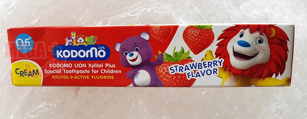 Kodomo Kids Toothpaste strawberry flavor tube close up front