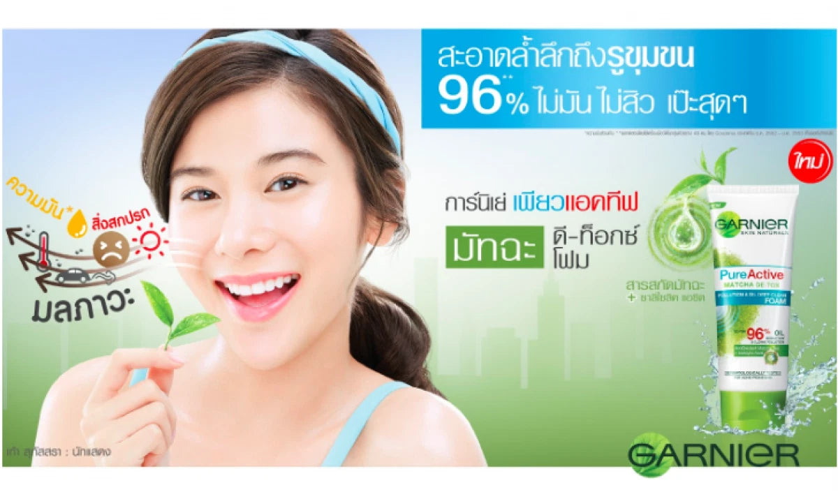 Promotional image featuring model holding Garnier Matcha DeTox Foam with product benefits displayed