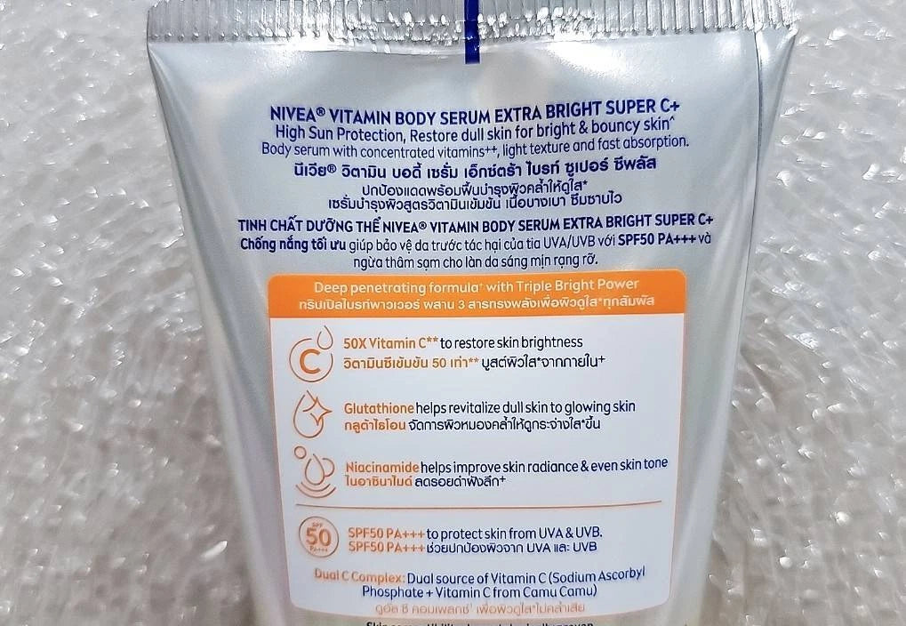Nivea Super C Body Serum Extra Bright SPF50 with Vitamin C for skin protection and brightness in 300 ml packaging.
