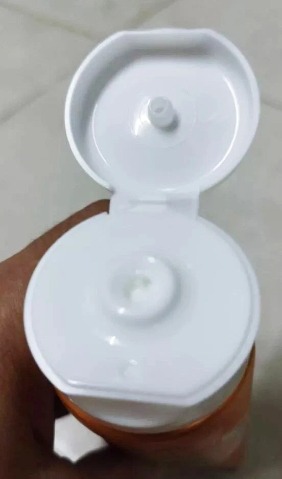 Nivea Extra Bright C Hya Foam flip cap dispenser open top view