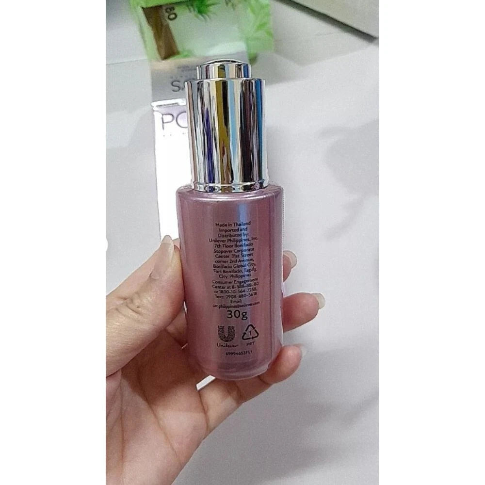 Ponds Bright Miracle Serum handheld bottle natural light