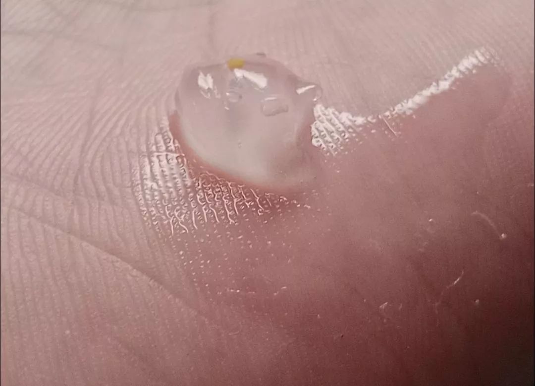 GMEELAN Orange Exfoliating Gel texture close up showing peeling gel effect