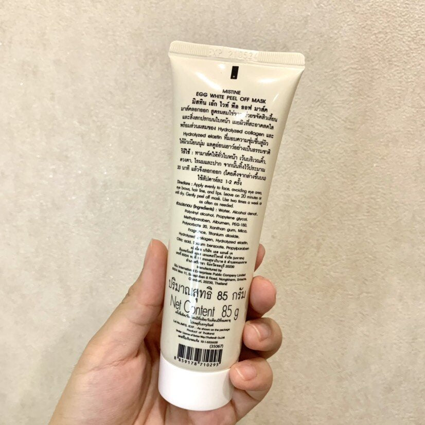 Mistine Egg White Peel Off Mask 85g tube held in hand front view