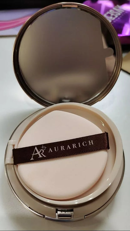 Aura Rich Cushion compact open with mirror and puff applicator