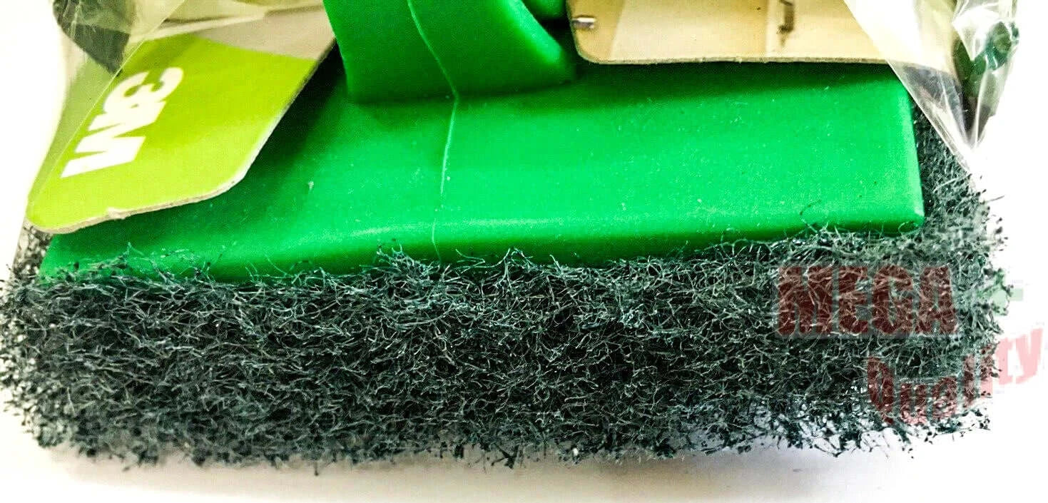 3M Scotch-Brite Scrubber heavy duty green pad with handle for effective scouring and cleaning tasks.
