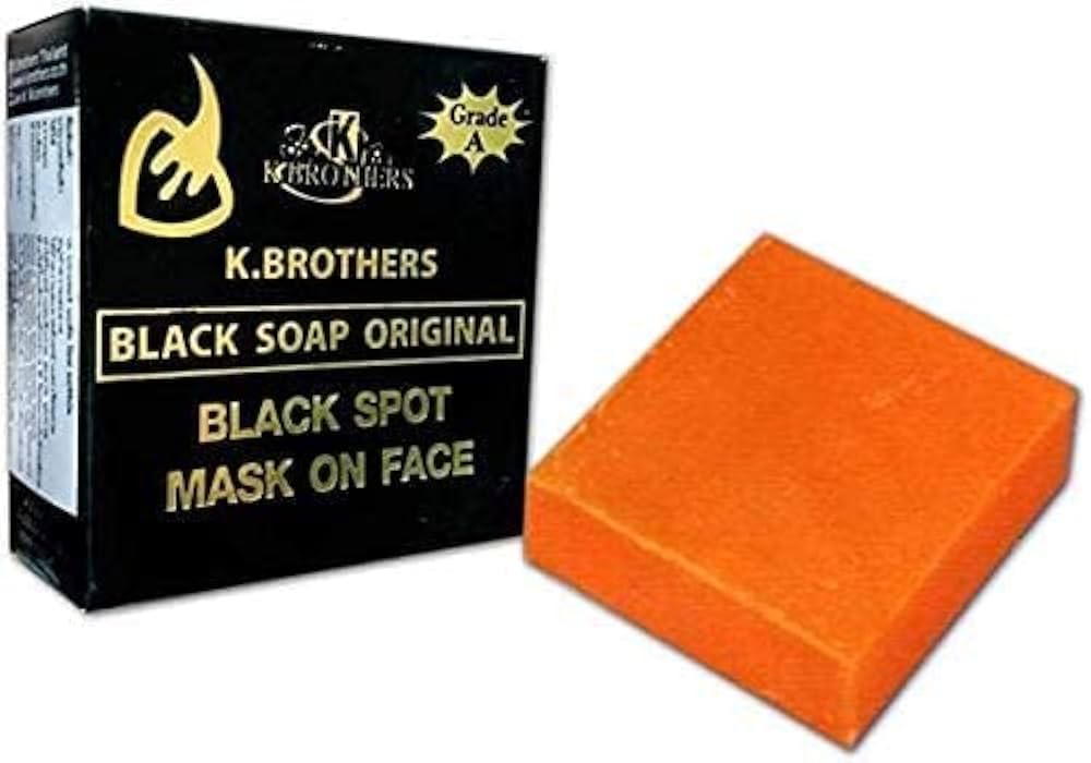 K Brothers Black Spot Soap black box packaging next to the orange soap bar