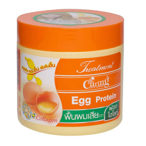 Front view of Caring Egg Protein Treatment large hair mask 500ml jar with egg and collagen graphics