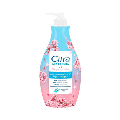 Citra AHA Sakura Lotion Bright UV Body Hyaluronic 500ml Moisturizing HYA in a blue and pink floral bottle.