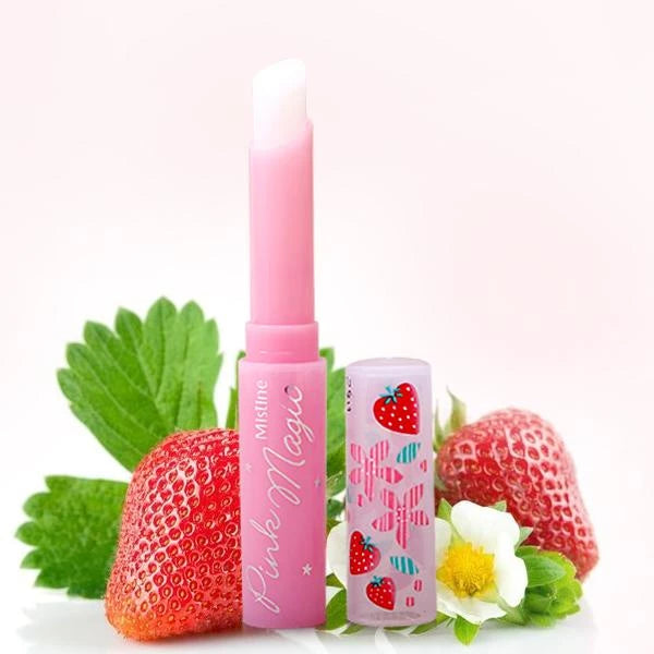 MISTINE Pink Magic Lip Balm Strawberry Vitamin E displayed with fresh strawberry and flowers