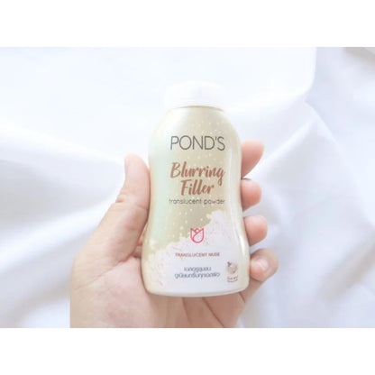 Pond's Blurring Filler Powder 45g bottle on fabric background