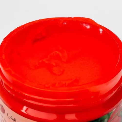 Carebeau Tomato Salt Scrub red salt texture inside jar