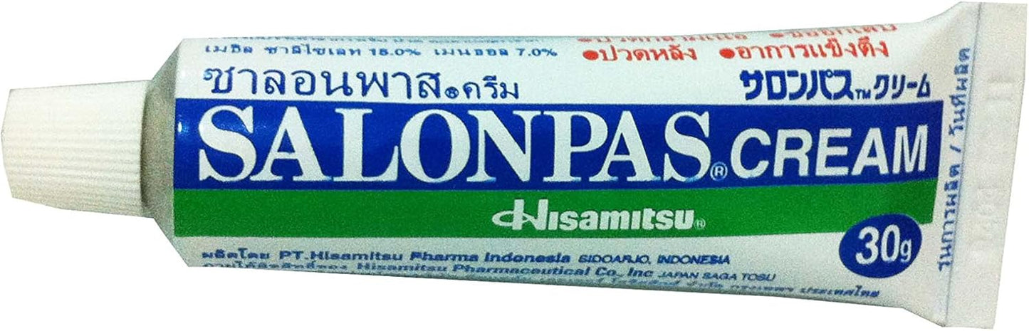 Salonpas Cream Pain Relief tube with green and blue branding used for fast-acting relief of back and shoulder aches.