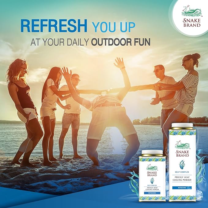 Snake Brand Prickly Heat Cooling Powder promotional image showing people on the beach using cooling body powder for freshness.
