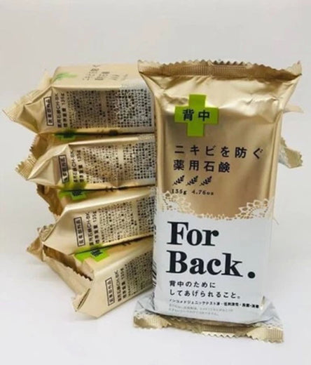Pelican For Back Acne Soap natural cleansing bar displayed with charcoal and herbal ingredients.