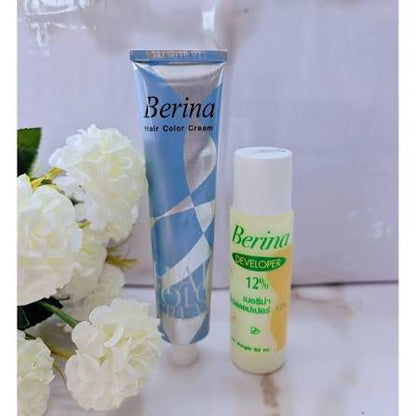Berina A18 Hair Color Cream with developer bottle and white flowers, showcasing vibrant hair dye products.