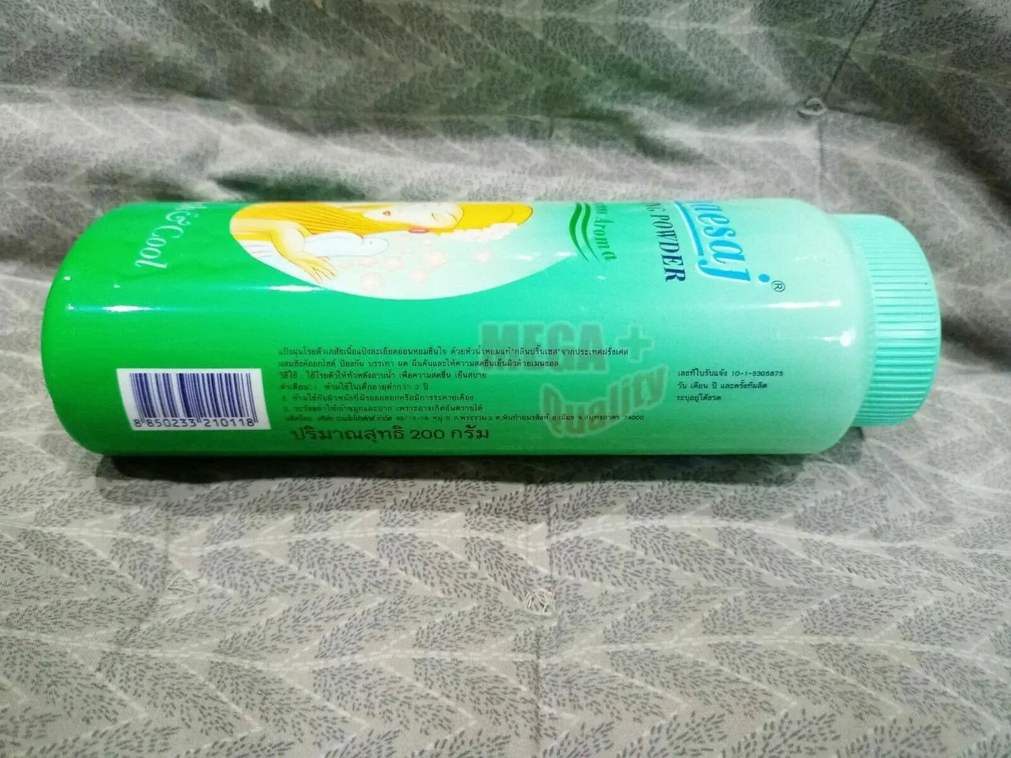 Bhaesaj Cooling Powder Princess Aroma packaging side view, featuring a vibrant green bottle with floral design.