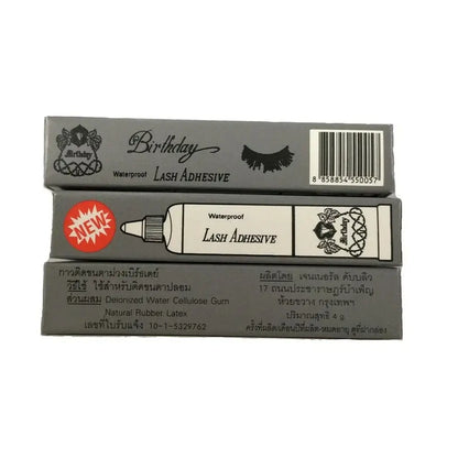 Birthday Lash Adhesive packaging boxes showing front, top, and back product details