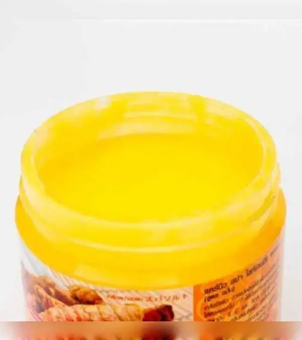 Carebeau Turmeric Spa Salt Body Scrub 700g Open Jar Exfoliating Salt Texture