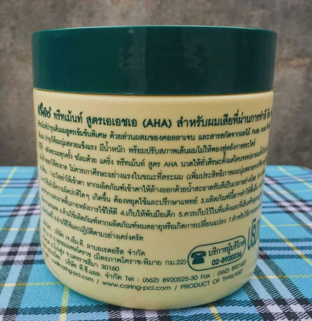 Caring AHA Hair Treatment cream jar back view with ingredients and instructions