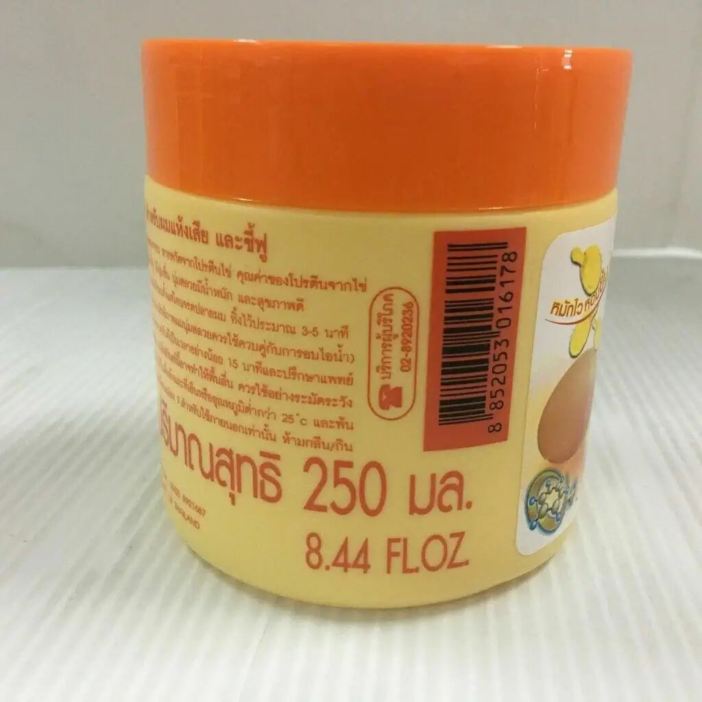 Back view of Caring Egg Protein Treatment hair mask jar showing barcode and volume information