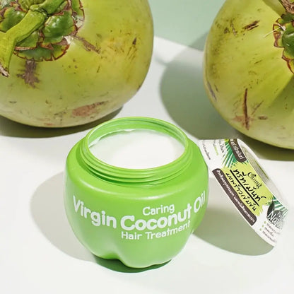 Caring Virgin Coconut Oil Hair Mask in green container with coconut in background for healthy hair treatment.
