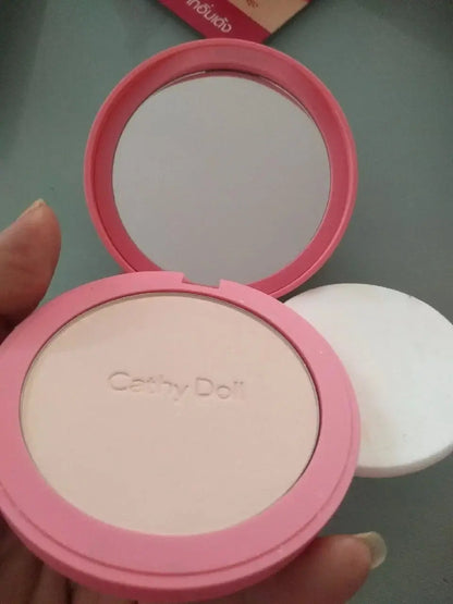 Cathy Doll CC Powder Pact open showing smooth powder and mirror, ideal for shine-free finish and makeup touch-ups.
