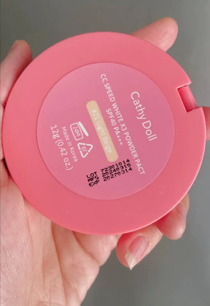 Back view of Cathy Doll CC Powder Pact compact displaying shade label and product details.