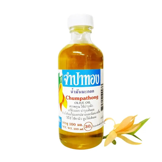 Chumpathong Olive Oil bottle for hair and skin nourishment, 100ml, displayed with yellow flower.