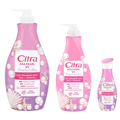 Three different sizes of Citra AHA Pearl UV Lotion pink bottles standing in a row