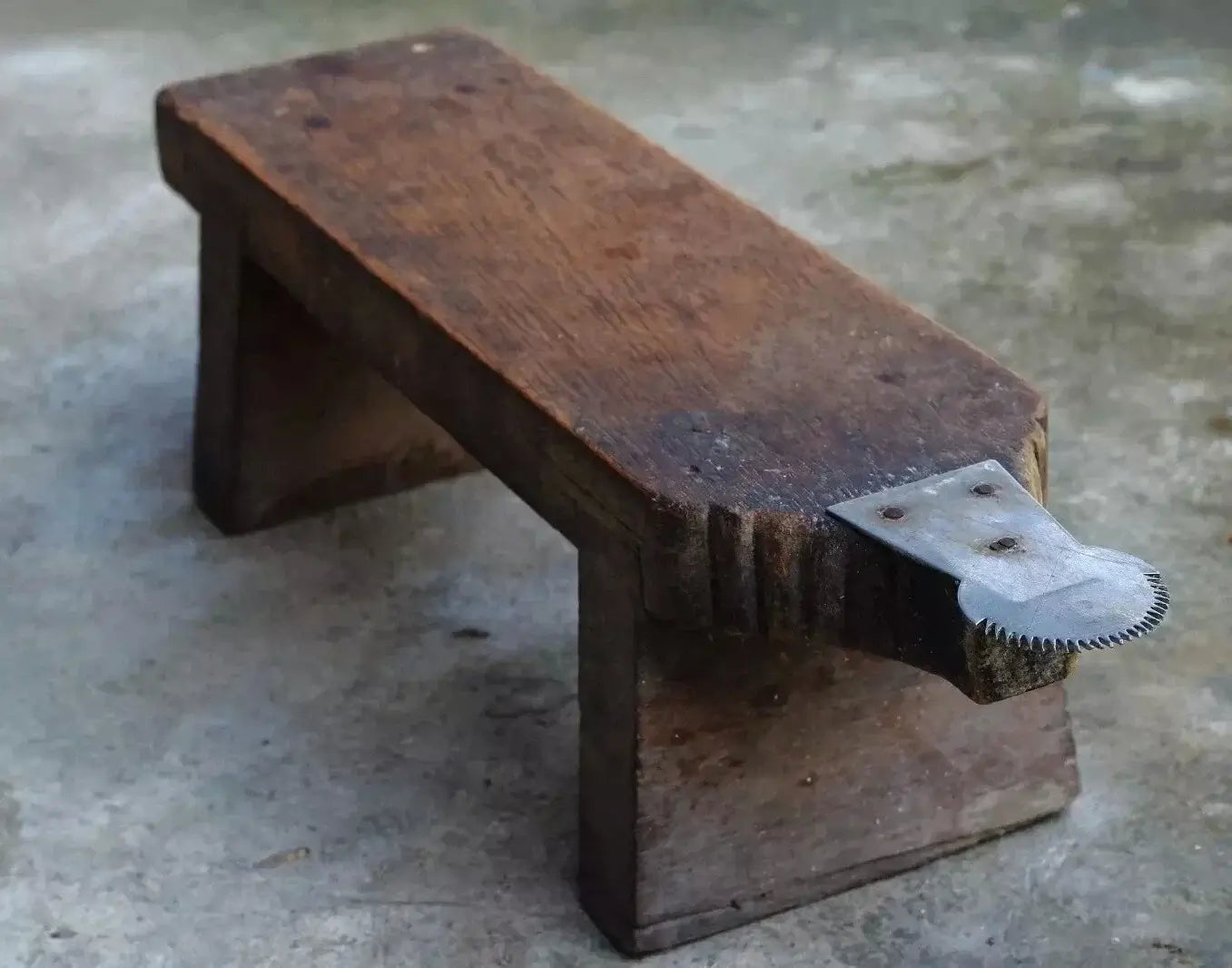 Coconut Grater Head Blade Installed on Traditional Wooden Grater Bench