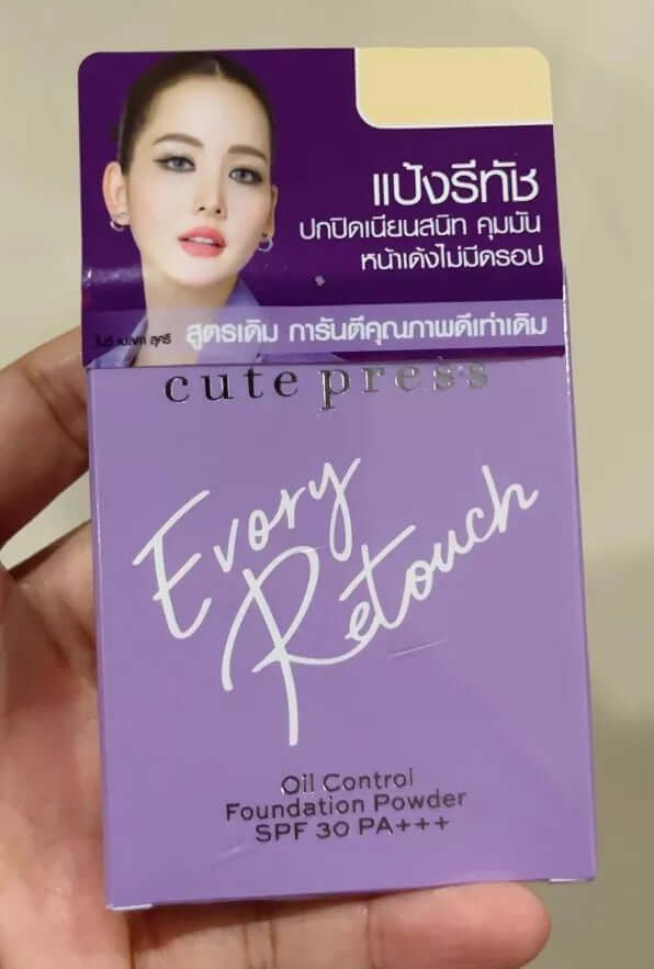 Hand holding Cute Press Evory Retouch box showing the top with shade code N1