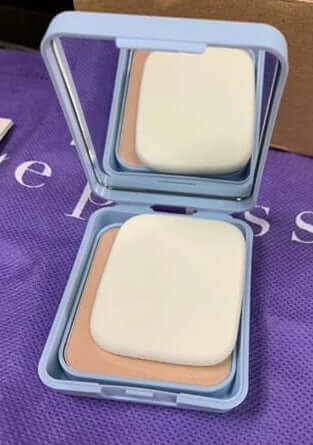 Open Cute Press Evory Snow Powder compact showing mirror and foundation powder with puff.