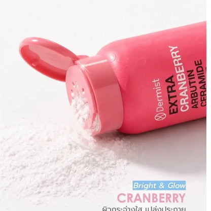 Dermist Cranberry Powder Extra Arbutin Ceramide in pink bottle, showcasing smooth matte texture for bright and glowing skin.