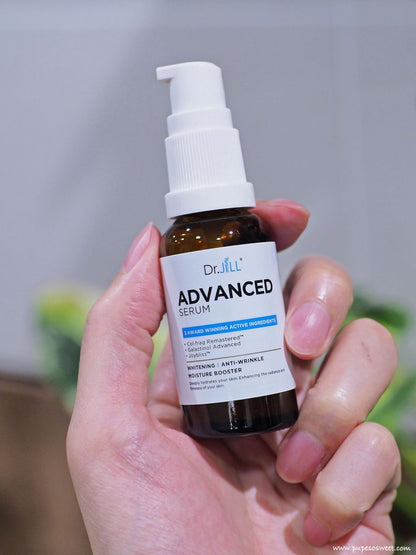 Dr.JiLL Advanced Serum 30ml bottle held in hand close up