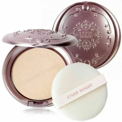 Etude Secret Beam Powder Pact SPF36 PA+++ compact with powder and puff, offering smooth and radiant face finish.