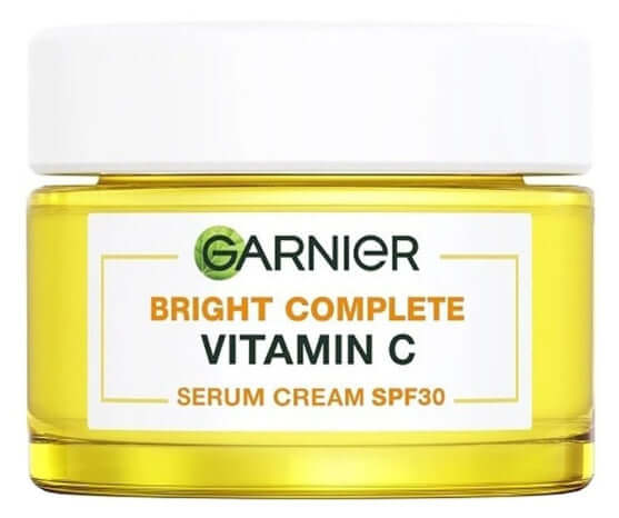 GARNIER VITAMIN C CREAM Bright Complete Serum SPF30 in a yellow jar for moisturizing UV protection.