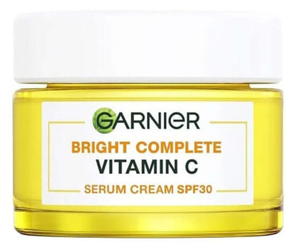 GARNIER VITAMIN C CREAM Bright Complete Serum SPF30 in a yellow jar for moisturizing UV protection.