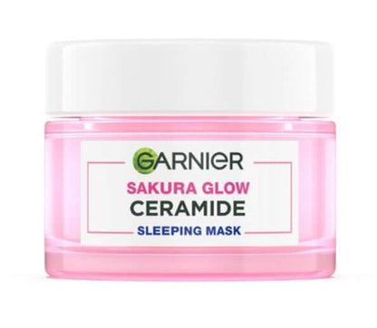 Garnier Sakura Glow Sleeping Mask Ceramide Night Cream in a pink jar for overnight skin hydration.