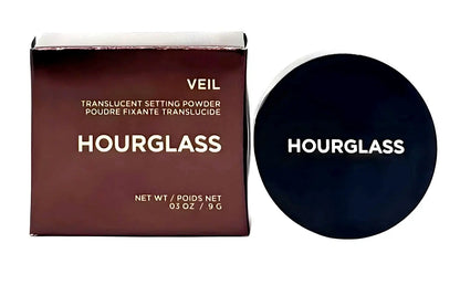Hourglass Veil Setting Powder packaging box next to closed powder jar lid.