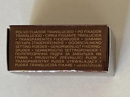Hourglass Veil Setting Powder box side showing product name in multiple languages.