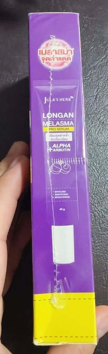 Julas Herb Longan Melasma Serum packaging featuring Alpha Arbutin for skin care.