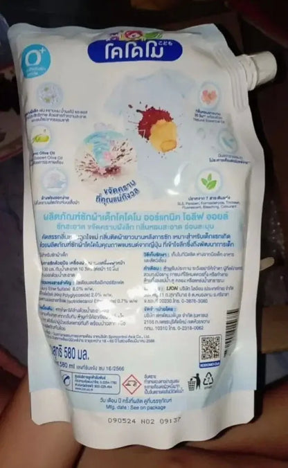 KODOMO Baby Liquid Detergent Olive Oil Laundry Wash Refill Fresh 580ml packaging with product details and usage information.